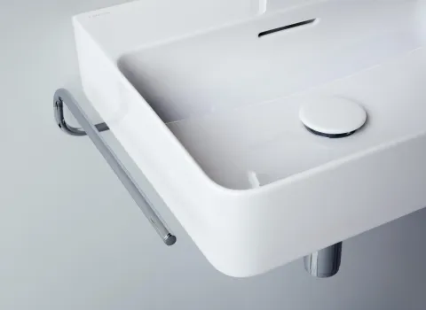 Moderner, weißer LAUFEN VAL Waschtisch mit integrierter Ablaufabdeckung und seitlich montierter, verchromter Armatur in minimalistischem Design.