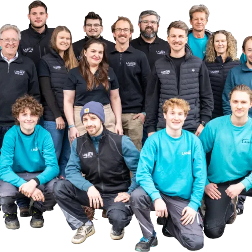 Teamfoto des gesamten Teams der Lassen GmbH 2026.
